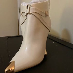 Bone and gold colored bootie